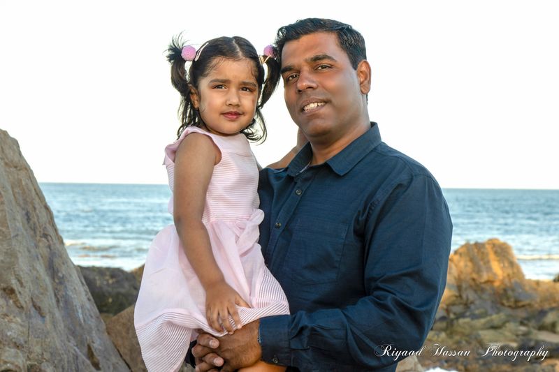 Father and daughter — shoreline